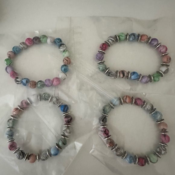 Very pretty.Good quality Multicolor mixed bracelets.Handmade.πΏπ§πΌββοΈπ$15 for2 - Picture 2 of 3
